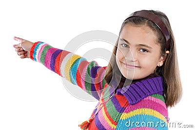 Adorable girl with woollen jacket pointing Stock Photo