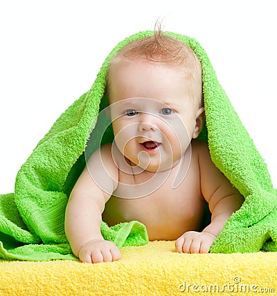 Adorable happy baby in colorful towel Stock Photo