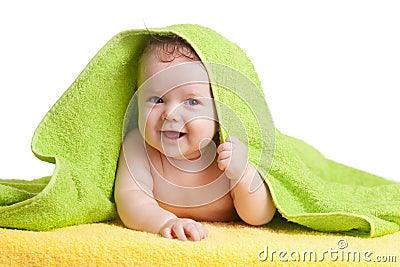 Adorable happy baby in colorful towel Stock Photo