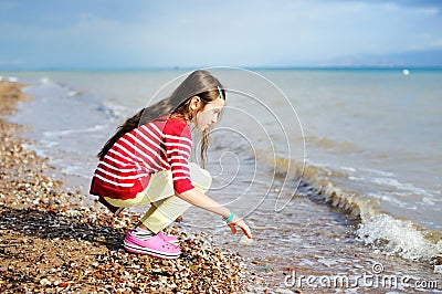 Adorable happy little girl on beach vacation Stock Photo