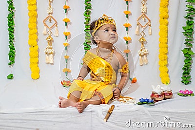 adorable infant dressed as hindu god krishna on the occasion of janmashtami celebrated at india Stock Photo