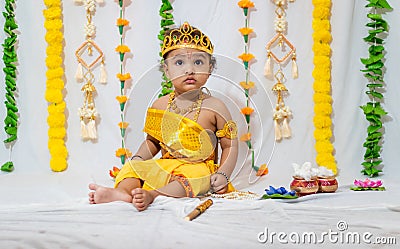 adorable infant dressed as hindu god krishna on the occasion of janmashtami celebrated at india Stock Photo