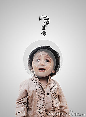 Adorable Intelligent Little Boy Thinking Question Mark Stock Photo
