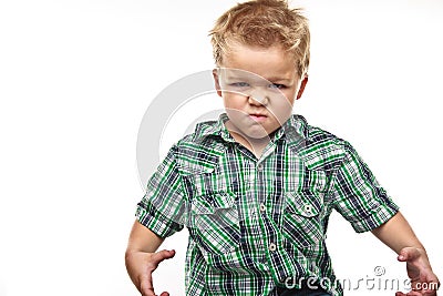Adorable little boy looking angry. Stock Photo