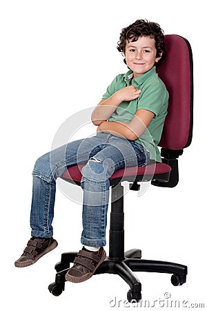 Adorable little boy sitting on big chair Stock Photo