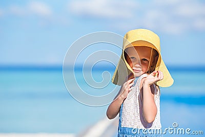 Adorable little girl at beach during summer Stock Photo