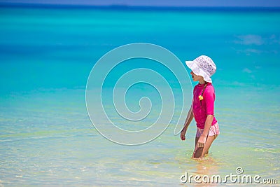 Adorable little girl at beach during summer Stock Photo