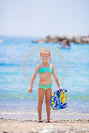 Adorable little girl at beach during summer vacation Stock Photo