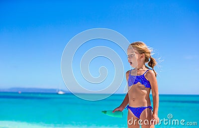 Adorable little girl have fun at tropical beach Stock Photo