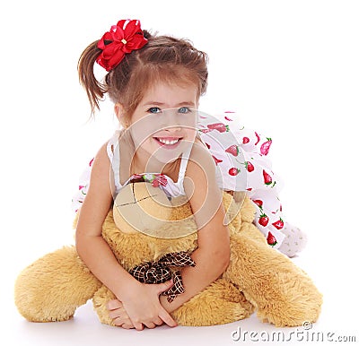 Adorable little girl teddy bear in hand Stock Photo