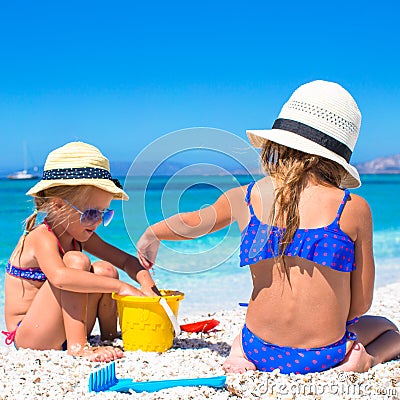 Adorable little girls at beach during summer Stock Photo