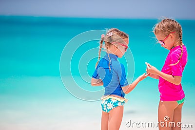 Adorable little girls at beach during summer vacation Stock Photo