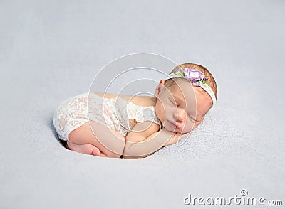 Adorable newborn baby in bodysuit Stock Photo