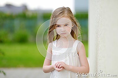 Adorable preschooler girl portrait outdoors Stock Photo