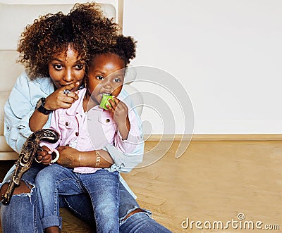 adorable sweet young afro-american mother with cute little daugh Stock Photo