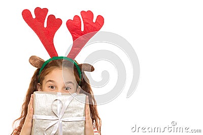 Adorable young girl with a Christmas present Stock Photo