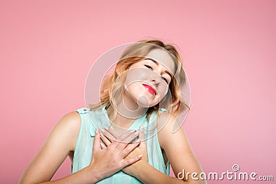 Adoration tender emotion girl press hands heart Stock Photo