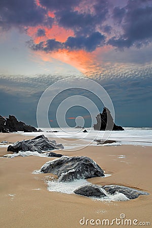 Adraga beach at sunset Stock Photo