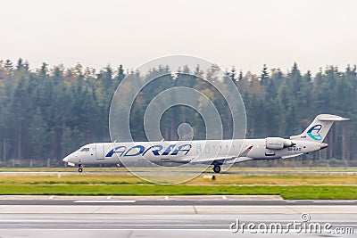 Adria Airways Canadair Regional Jet CRJ900 taking off at Ljubljana airport Editorial Stock Photo