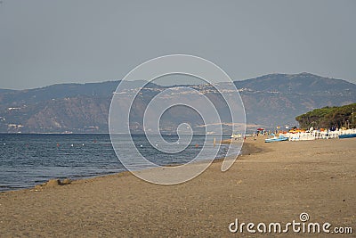 Adriatic sea sandy beach and hill mountain on background Stock Photo