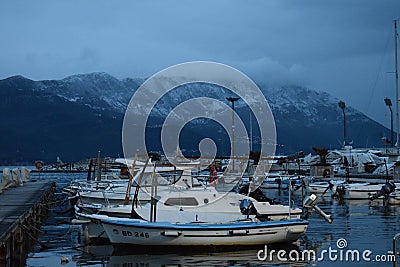 Adriatic shore: Calm waters, snowy mountains! Editorial Stock Photo