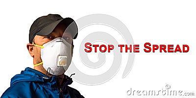 An adult male worker is wearing an N95 respirator mask with the message STOP THE SPREAD in red text Stock Photo