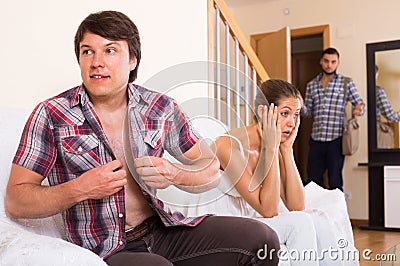 Adult and cheating partner at home Stock Photo