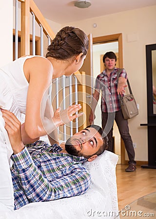 Adult and cheating partner at home Stock Photo