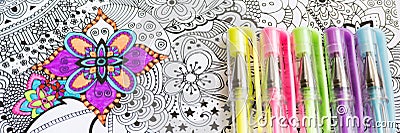 Adult coloring book, new stress relieving trend. Art therapy, mental health, creativity and mindfulness concept. Stock Photo