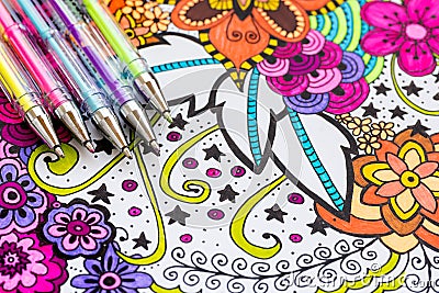 Adult coloring book, new stress relieving trend. Art therapy, mental health, creativity and mindfulness concept. Adult coloring. Stock Photo