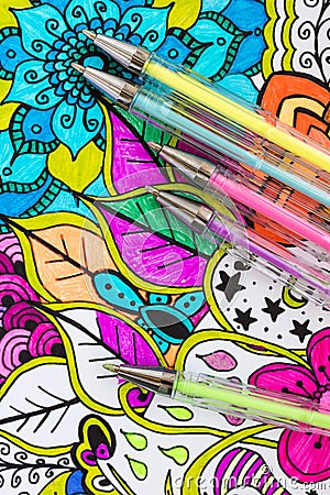 Adult coloring book, new stress relieving trend. Art therapy, mental health, creativity and mindfulness concept. Stock Photo