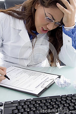 Adult doctor in tension Stock Photo