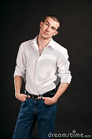 Adult guy on black backout Stock Photo