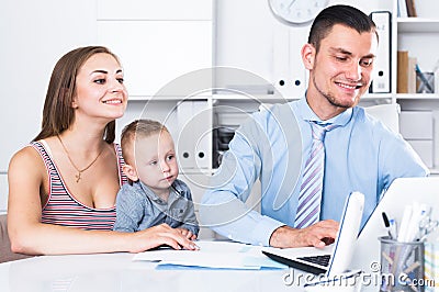 Adult male lawyer talking with young woman Stock Photo