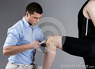Adult male physiotherapist Stock Photo