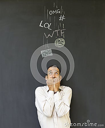 Adult man frustrated and stressed from social media overload Stock Photo