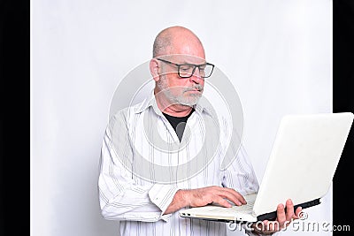 adult man using cell phone communication technology use S3niorLife Stock Photo