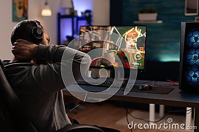 Adult preparing to play video games on monitor Stock Photo