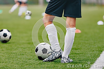 Adult Soccer Training Session. Football Player with Ball on the Field Stock Photo