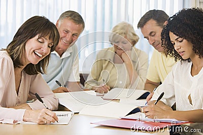 Adult students studying together Stock Photo