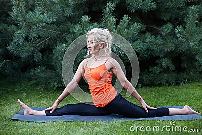 Adult woman doing yoga Stock Photo