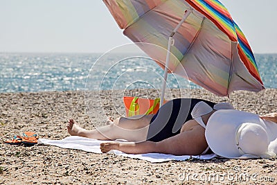 Adult woman overweight on the beach Editorial Stock Photo
