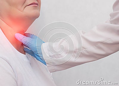 Adult woman on reception at the doctor who has problems with the thyroid gland and the endcrine system, close-up, patient Stock Photo