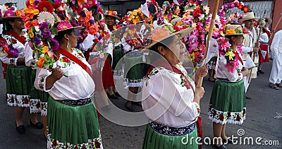 Adult women with traditional dress and flowers Editorial Stock Photo