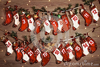 Advent calendar with gifts in children's socks Stock Photo