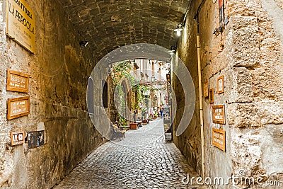 Quaint Shops Line A Cobblestone Alley In Orvieto, Italy Editorial Stock Photo