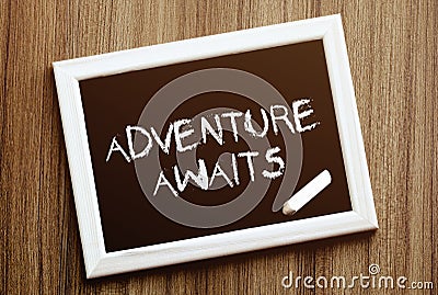 Adventure awaits. Hand writing with copyspace for text. Nice texture Stock Photo