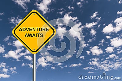 Adventure awaits traffic sign Stock Photo