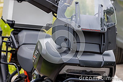 adventure plastic transparent windshield of Harley-Davidson Pan America 1250 Motorcycle, closeup with red inscription of Editorial Stock Photo