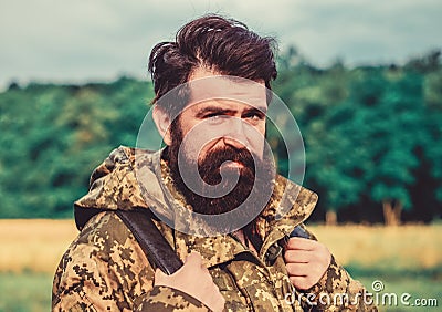 Adventures. brutal male poacher. male beard care. bearded man hiking with backpack. mature hipster with beard in Stock Photo